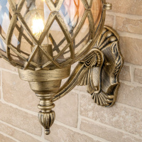 Уличный настенный светильник Elektrostandard Sirius U черное золото a025302